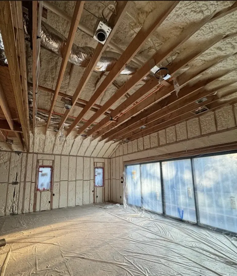 Interior walls and ceiling insulated with spray foam during new construction in Castro Valley